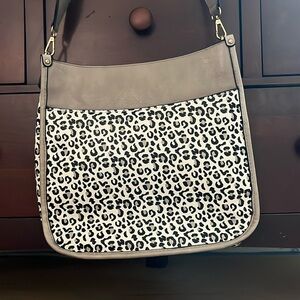 Animal print shoulder bag/crossbody purse. 20 inch long shoulder strap.